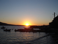 Sonnenuntergang im Hafen von Amoudi