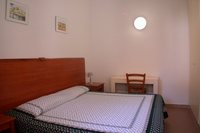 Schlafzimmer in Feriendorf Orizzonte
